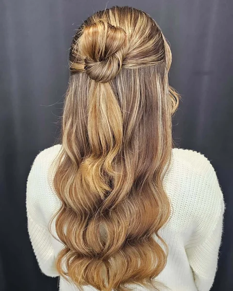 Messy Textured Half-Bun with Romantic Cascading Curls