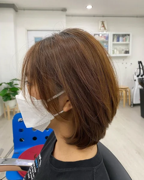 Textured Honey-Brown Korean Bob with Wispy Ends