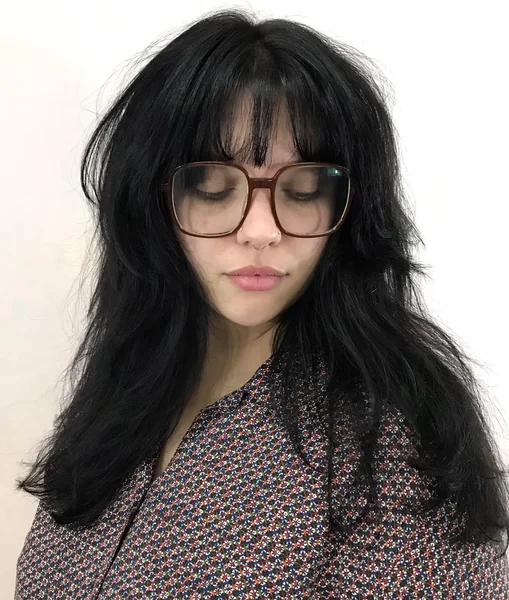 Messy Black Wolf Cut with Bangs