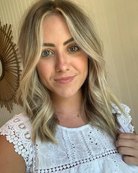 Soft Blonde Waves with Side Part