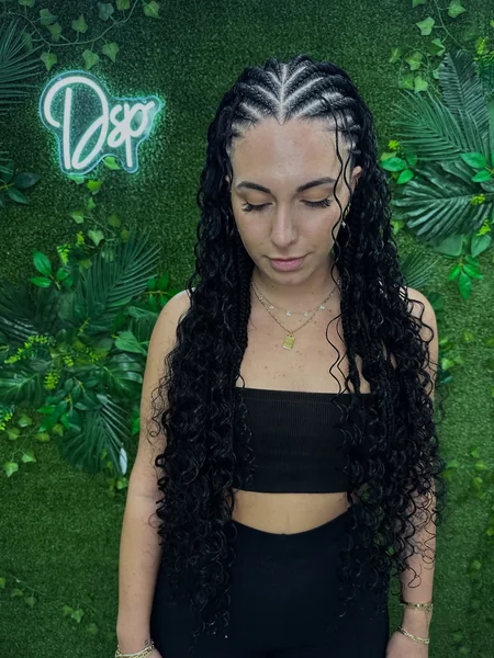 Cornrow Hairstyle with Long Curly Extensions