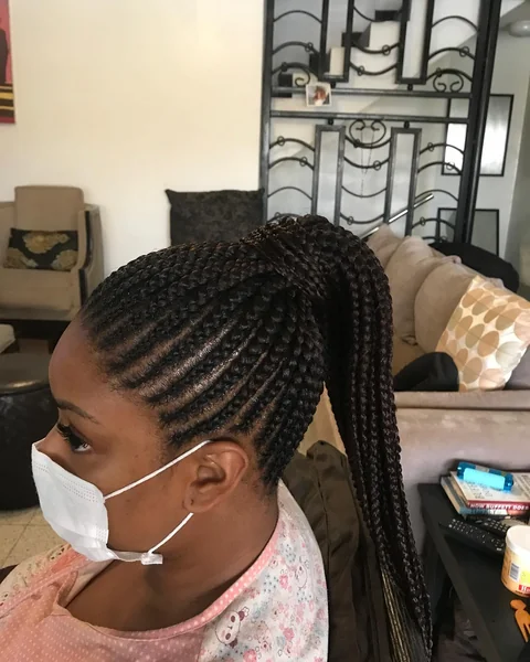 Cornrow Ponytail with Feed-In Braids