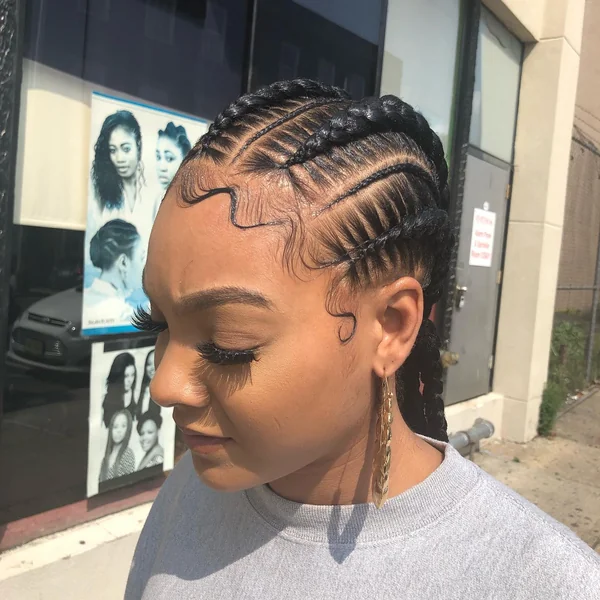 Sleek Side Cornrows with Swoop Baby Hair