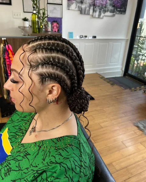 Cornrow Low Bun with Curly Pieces