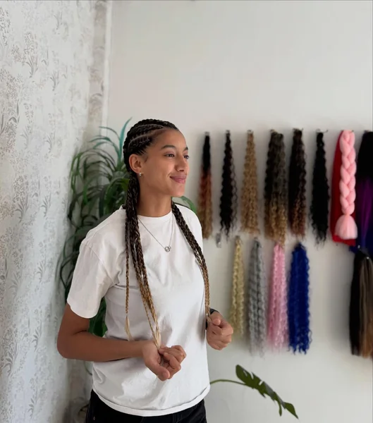 Two Straight-Back Cornrows into Pigtails