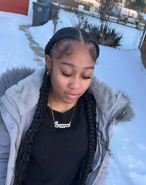 Two Braids with Loose Curly Ends for Extra Texture