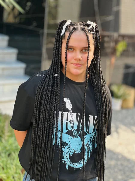 Long Black Box Braids with White Bow Accents