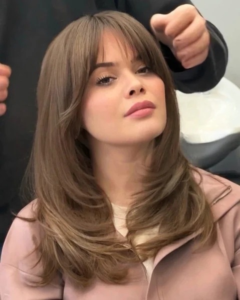 Curtain Bangs Being Styled Medium Hair