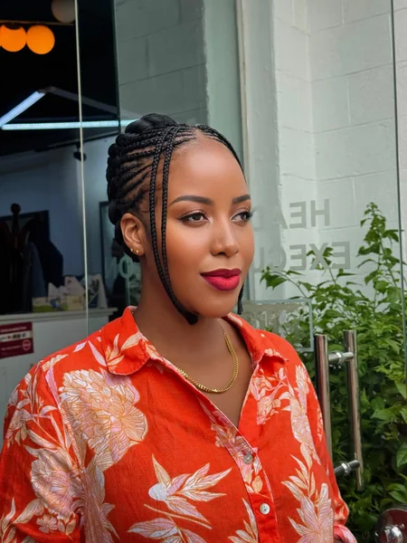 Sleek Cornrows into Low Updo