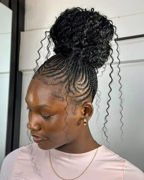 Cornrow Braids into Voluminous Curly Bun