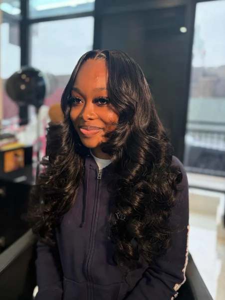 Deep Side Part Curly Sew In