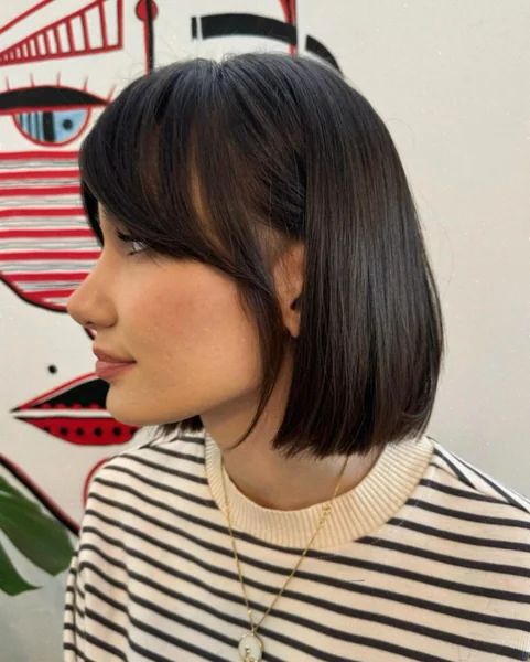 Short Bob with Side-Swept Wispy Bangs