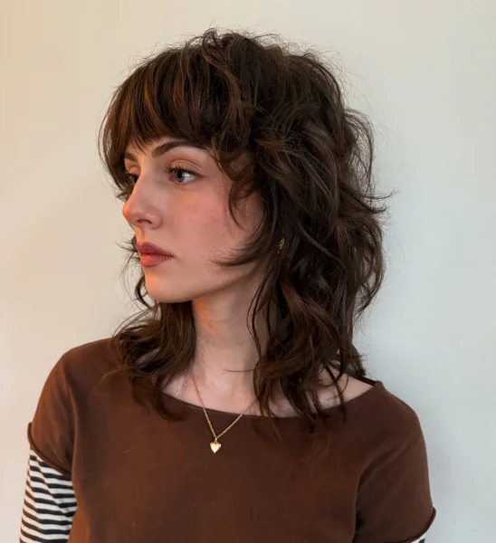 Curly Shag Haircut with Wispy Fringe