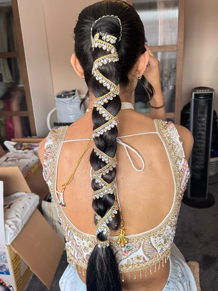 Sleek Braided Ponytail with Kundan Wrap