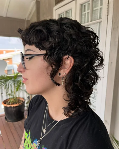Side-Swept Curly Shag Haircut
