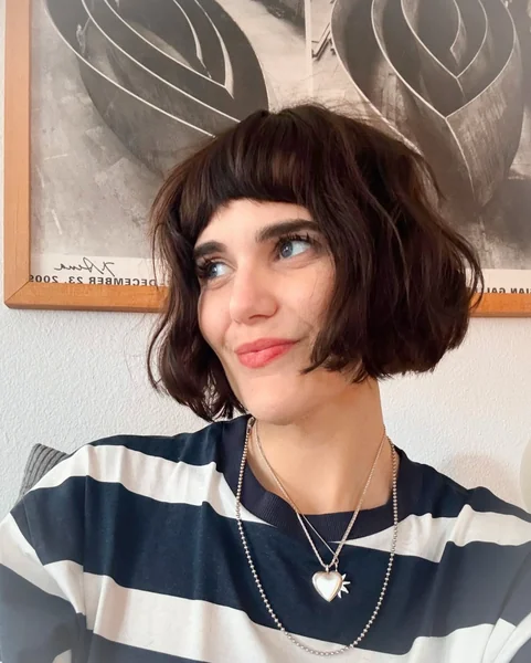 Layered Wavy Bob with Blunt Bangs