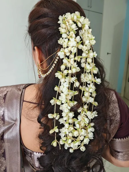 Curly Half-Up with Jasmine Strand Cascade