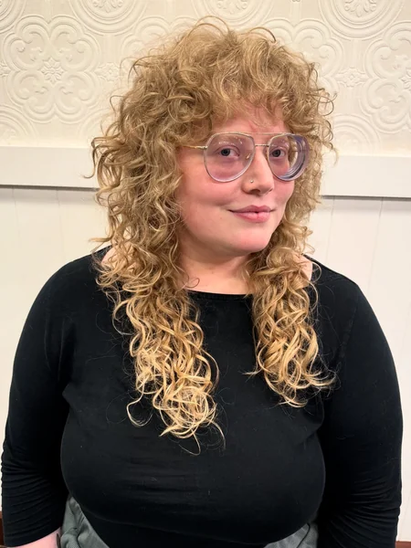 Long Blonde Curly Shag Haircut