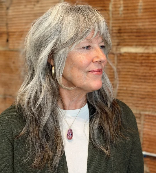 Long Shaggy Layered Hairstyle with Bangs
