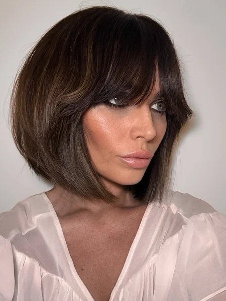 French Bob Haircut with Curtain Bangs