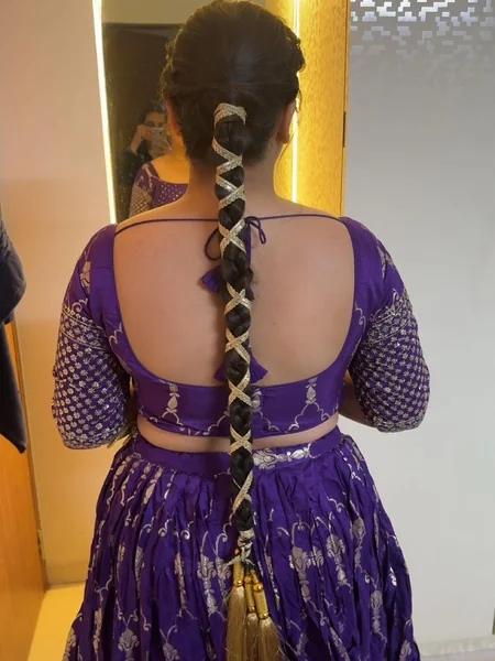 Braided Ponytail Wrapped in Silver Ribbon
