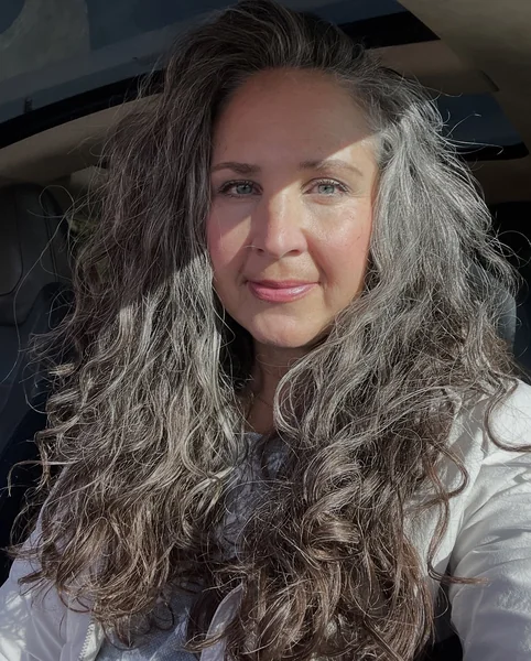 Long Curly Gray Hairstyle for Women Over 50