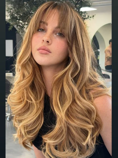 Wavy Hairstyle with Bangs