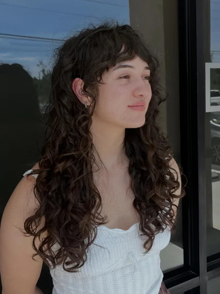 Long Curly Shag with Curtain Bangs