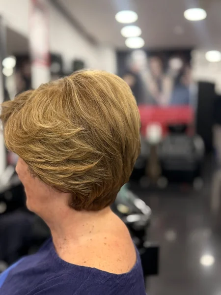 Short Feathered Pixie with Warm Highlights