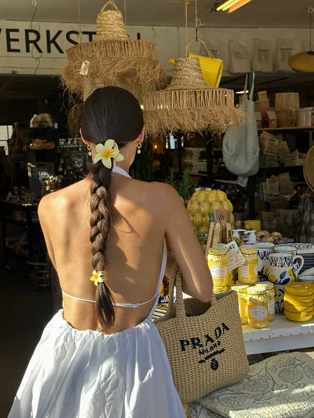 Braided Ponytail With Tropical Flowers