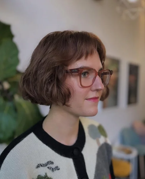 French Bob Haircut with Glasses