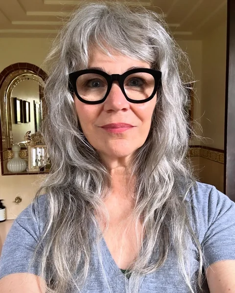 Long Shaggy Gray Hairstyle with Bangs