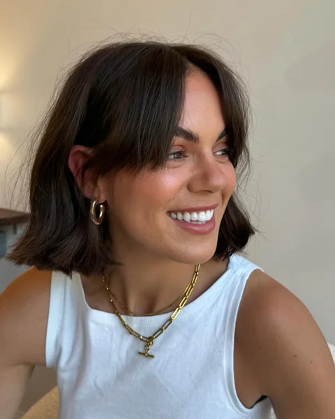 French Bob Haircut Curtain Bangs