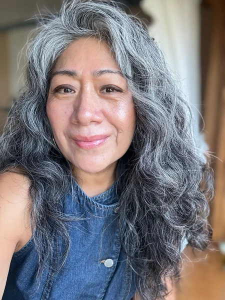Long Wavy Gray Hairstyle for Women Over 50