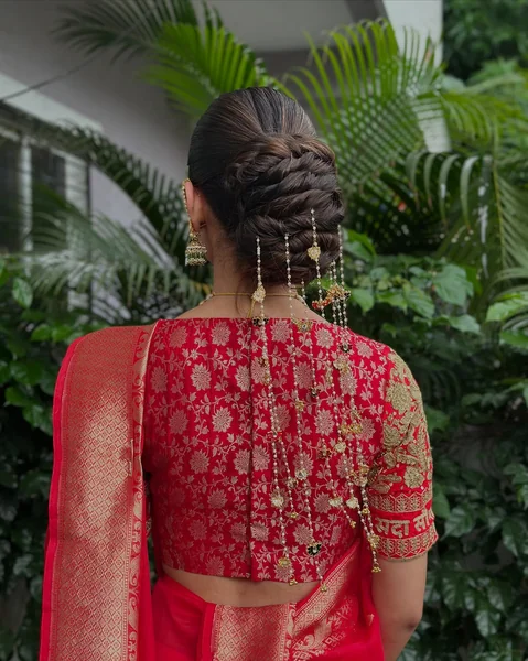 Twisted Updo with Layered Tassel Jewelry