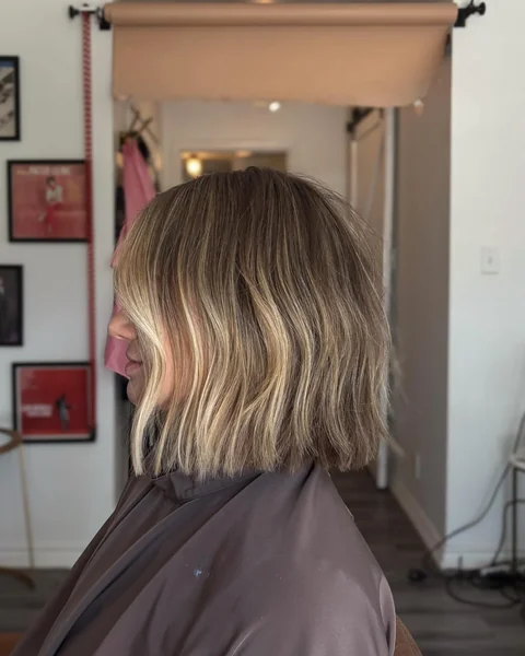 Wavy Blonde Bob with Highlights