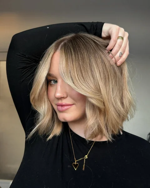 Blonde Wavy Bob with Bangs Smile
