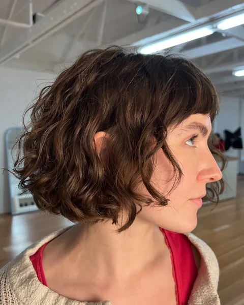 Curly Bob with Blunt Bangs