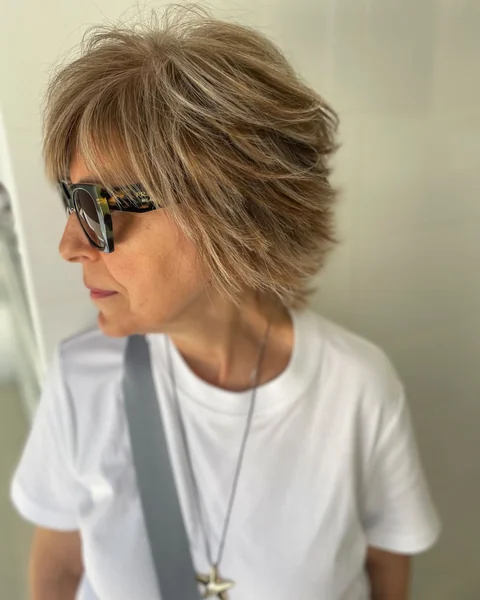 Shaggy Layered Cut with Sunglasses Styling