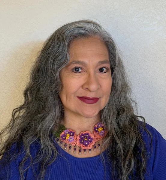 Long Wavy Gray Hairstyle with Center Part