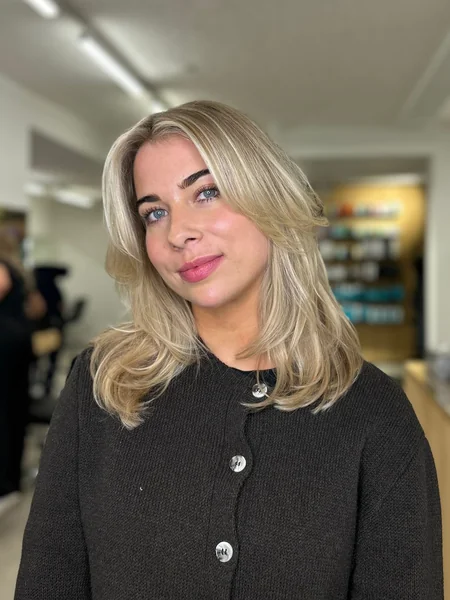 Straight Layered Cut for Medium Blonde Hair