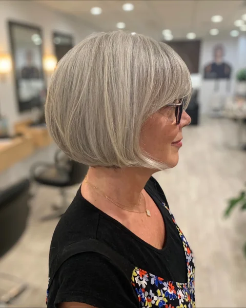 Side View Bob with Bangs and Glasses
