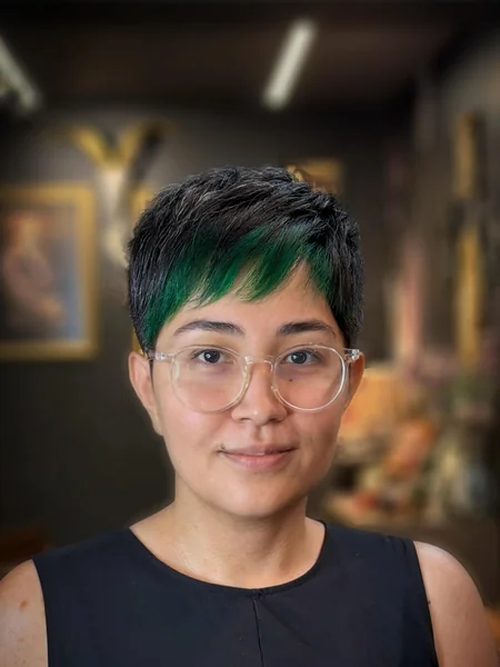 Pixie Haircut with Bold Green Bangs