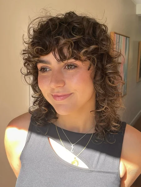 Curly Shag with Curtain Bangs