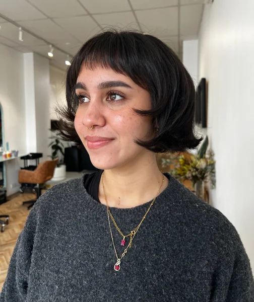 Dark Bob with Face-Framing Wispy Bangs