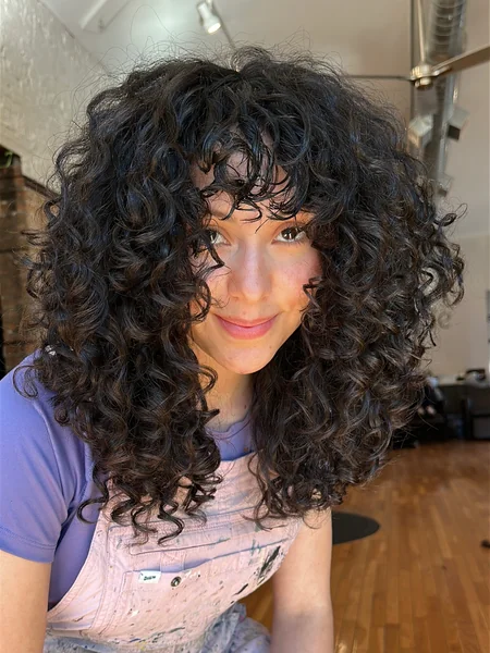 Curly Shag Haircut with Bangs