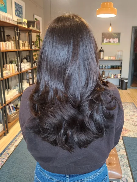 Dramatic U-Shaped Haircut with Curled Layers