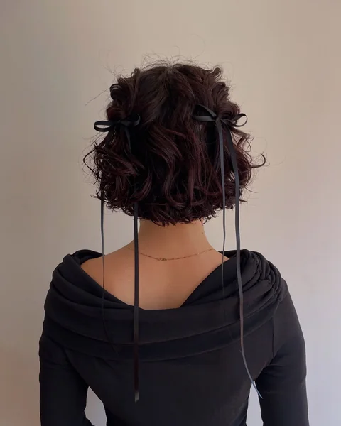 Short Curly Bob with Ribbon Bows