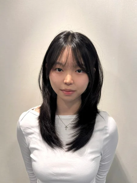 Layered Haircut Oval Face with Blunt Bangs