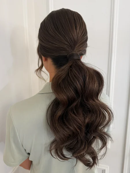 Low Wrapped Ponytail with Waves